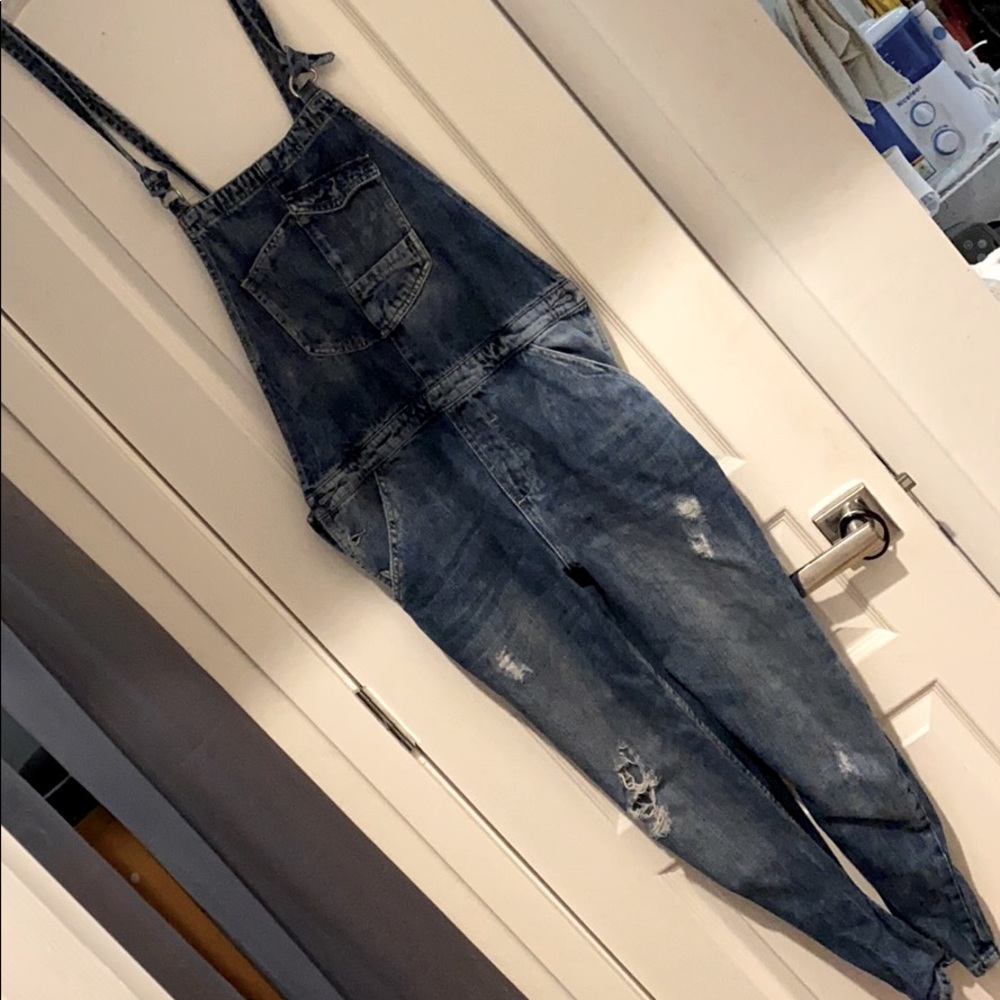 Denim overalls.